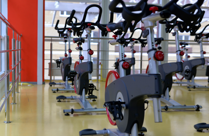 Indoor cycling exercise equipment at a gym
