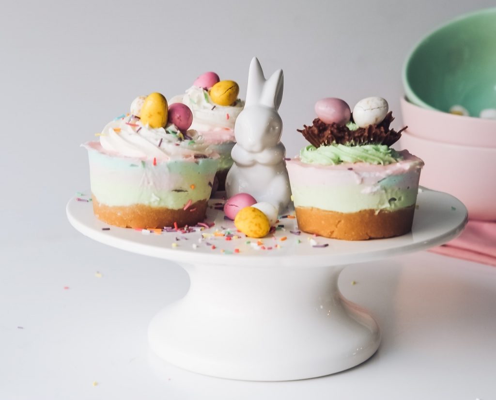 Easter cupcakes with white Easter bunny on white cake stand